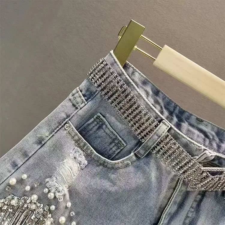 Heavy embellished rhinestone denim shorts for women, American style high-waisted slimming beaded fringe distressed jeans