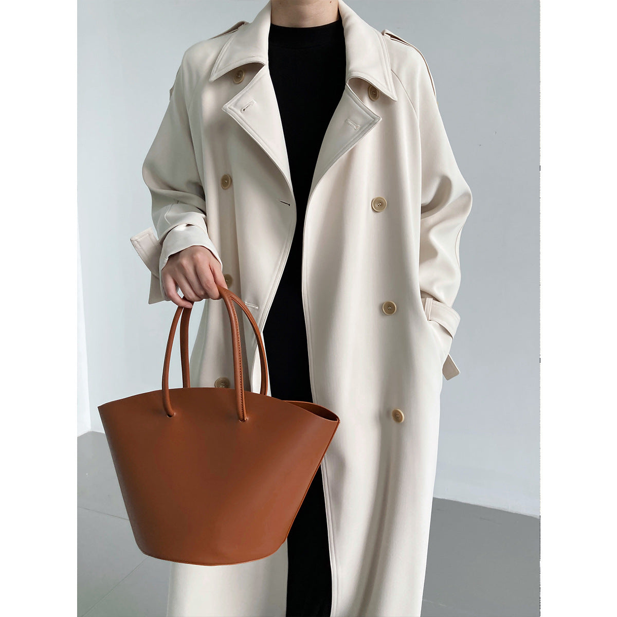 Loose mid to long over the knee trench coat for women