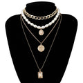 Layered Pearl & Crystal Coin Statement Choker