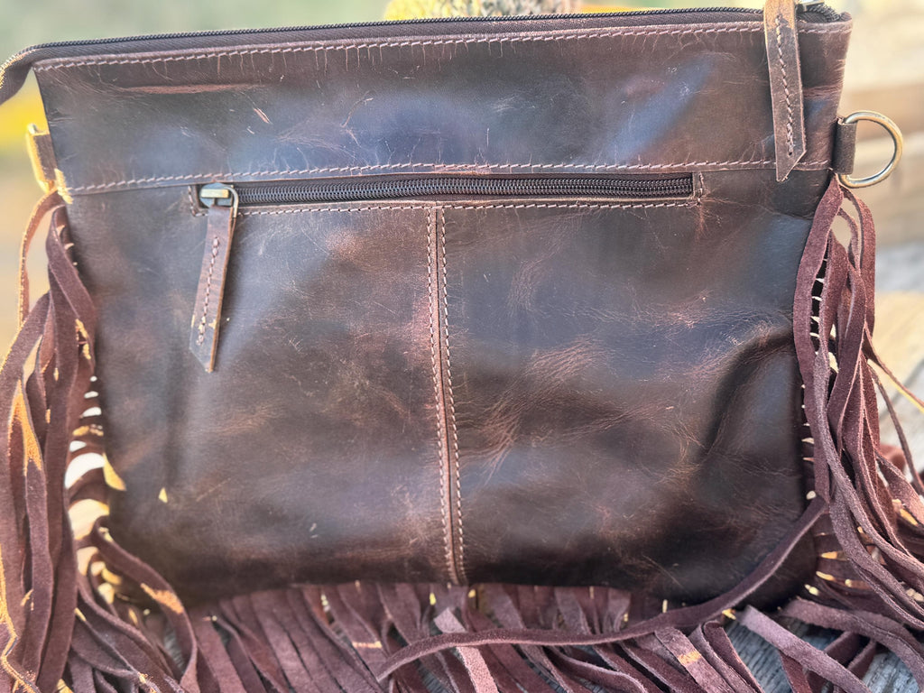 Western Leather Purse of Brown Spotted Cowhide with tooling and fringe